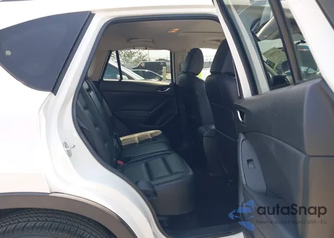 2014 Mazda Cx-5 Grand Touring z USA, uszkodzony, nr VIN JM3KE2DY8E0315178